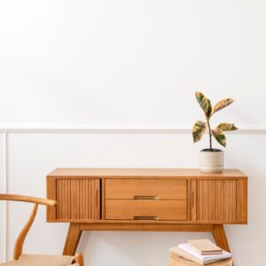 Rubber plant on a wooden sideboard table Capri Bedside Table