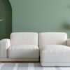 Sofa in green living room with copy space, 3D rendering Milano Sofa